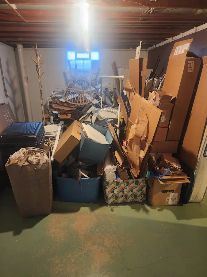 Roll-off dumpster container at job site for Yard Waste Dumpster Rental in Goldsby